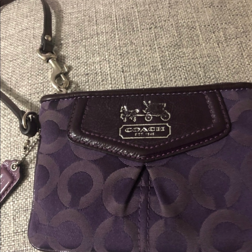 Coach Plum Signature Wristlet